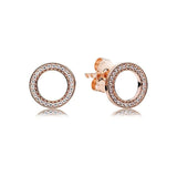 round shape diamond rose gold earrings
